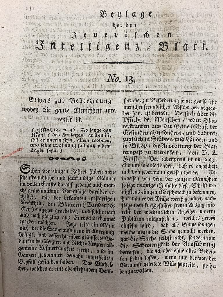 Rezension von B. L. Faust 'Versuch über die Pflicht der Menschen jeden Blatternkranken aus der Gemeinschaft der Gesunden abzusondern, und dadurch zugleich in den Städten und Ländern und in Europa die Ausrottung der Blatternpest zu bewirken' in der Beilage des 'Jeverischen Intelligenz-Blattes' Nr. 13 von 1795, in der strikte Quarantäne-Regeln für Erkrankte gefordert werden